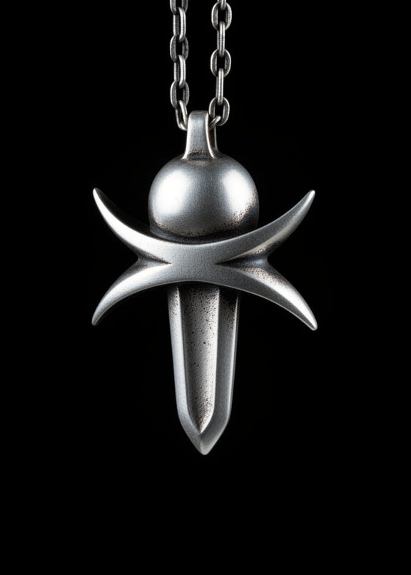 Silver pendant necklace on a black background